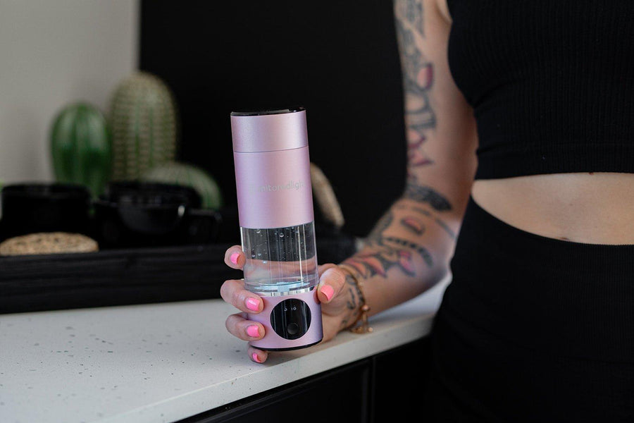 Mito Red Light Therapy Hydrogen Water Bottle - MitoHydro being held by female 